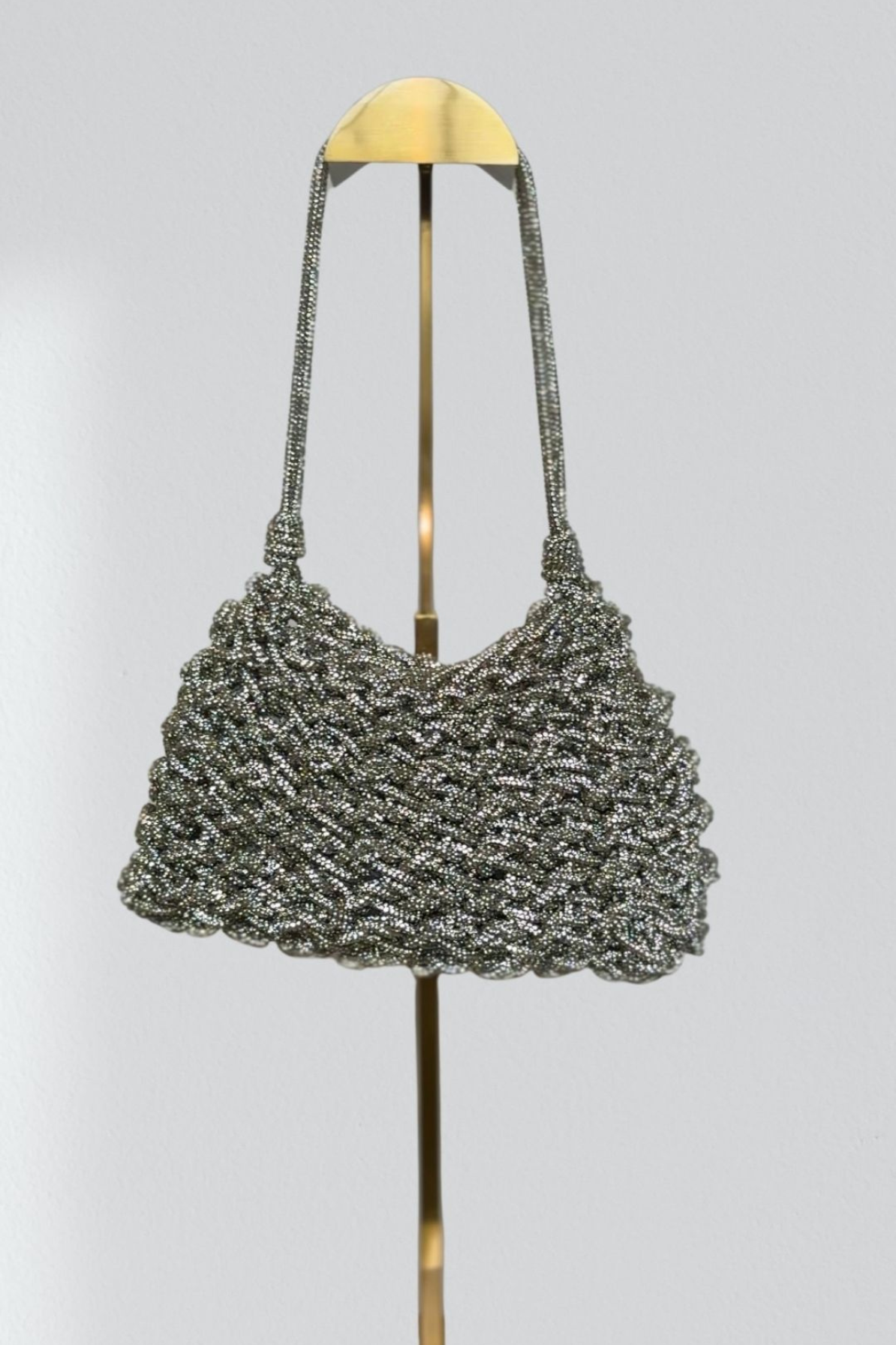 saint-tropez-baguette-bag-in-silver-by-mela